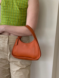 Orange vintage Coach handbag