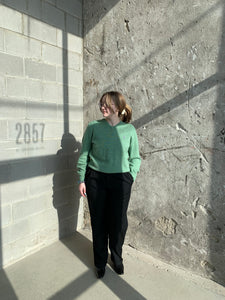 green wool sweater