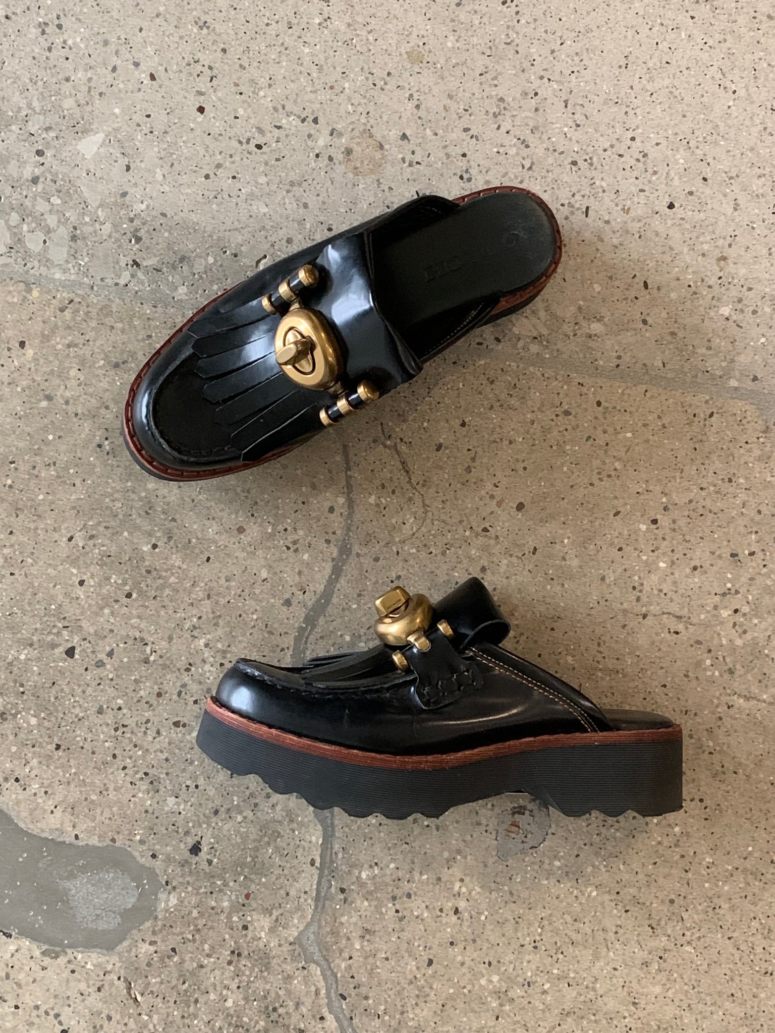 Coach black Turnlock Creeper Slides