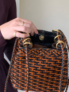 Woven flat bottomed shoulder bag