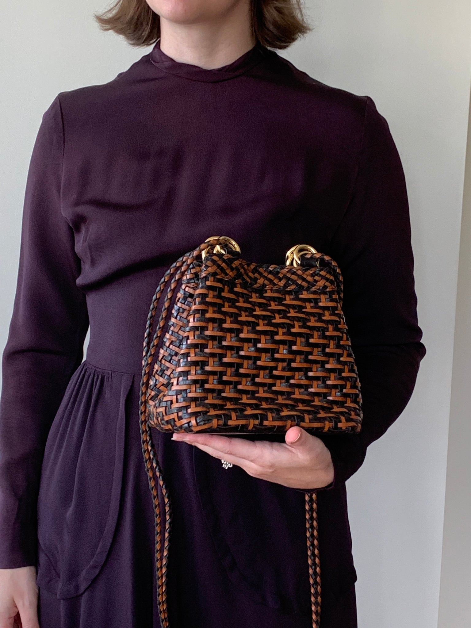 Woven flat bottomed shoulder bag
